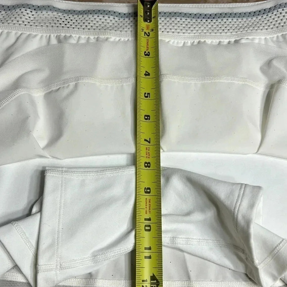 New Balance white skort with lace hem , pin holes in skirt and cut out in band - Picture 11 of 13